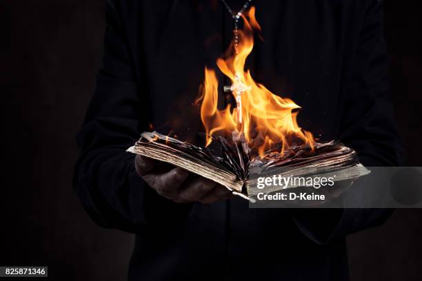 priest - cross fire stock pictures, royalty-free photos & images