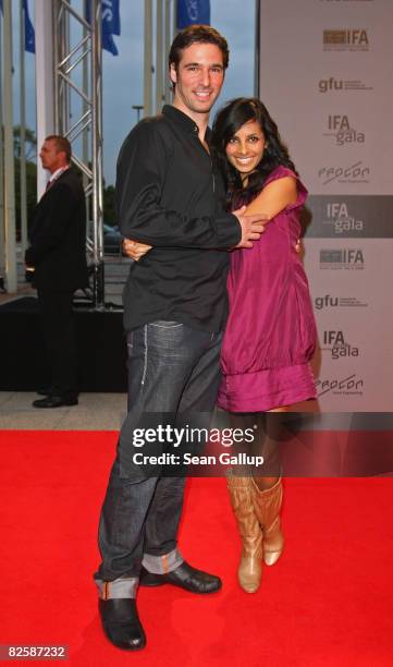 Television presenter Collien Fernandes and friend Rico Rex attend the IFA Opening Gala at the IFA consumer elctronics trade fair on August 28, 2008...