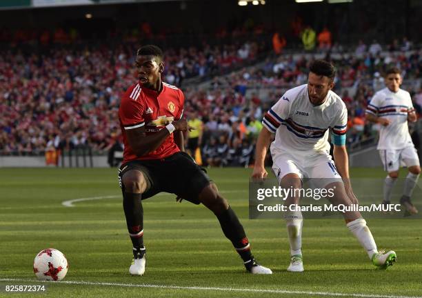 Paul Pogba of Manchester United and Vasco Regini of Sampdoria during the Aon Tour pre season friendly game between Manchester United and Sampdoria at...