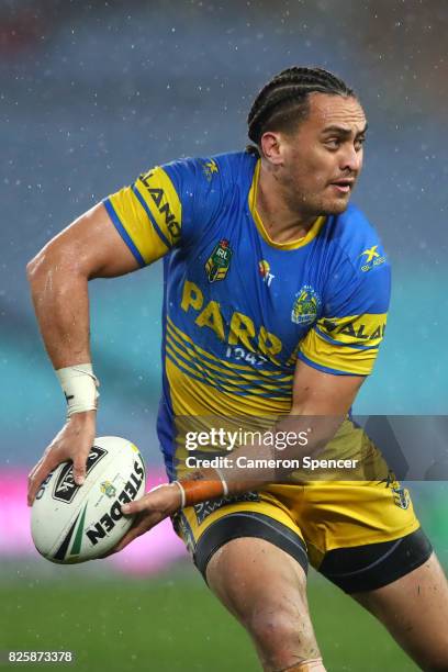 Brad Takairangi of the Eels passes during the round 22 NRL match between the Canterbury Bulldogs and the Parramatta Eels at ANZ Stadium on August 3,...