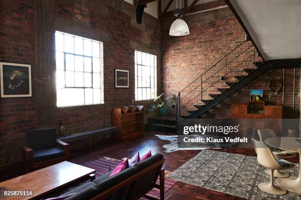 interior of new york style loft, holiday rental apartment - loft stock-fotos und bilder