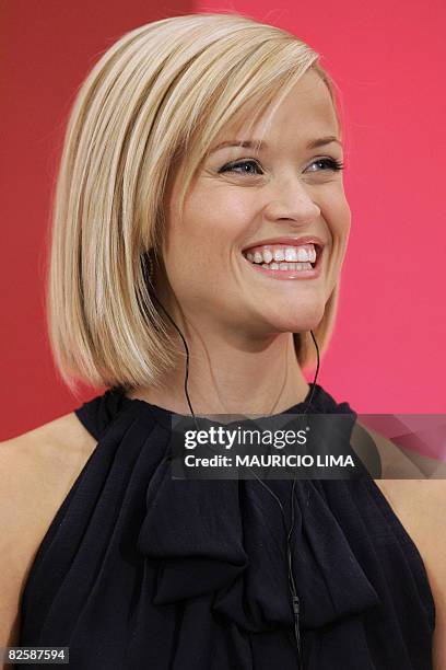 Oscar-winning star of 'Walk the Line' and 'Legally Blonde', US actress Reese Witherspoon smiles during an event to spread a message of female...