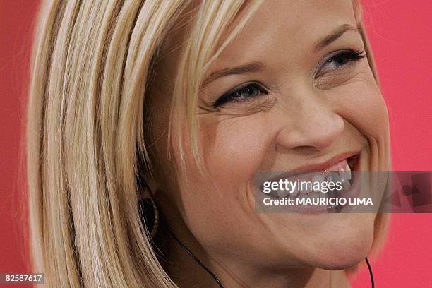 Oscar-winning star of 'Walk the Line' and 'Legally Blonde', US actress Reese Witherspoon smiles during an event to spread a message of female...