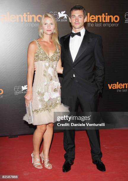 Actress Claire Danes and guest attend the Valentino: The Last Emperor VIP Screening during the 65th Venice Film Festival held at the Teatro La Fenice...