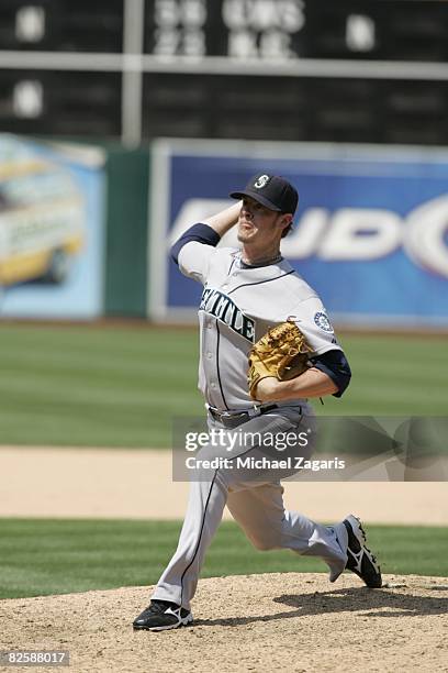 Mark Lowe of the Seattle Mariners pitches during the game against the Oakland Athletics at McAfee Coliseum in Oakland, California on July 10, 2008....