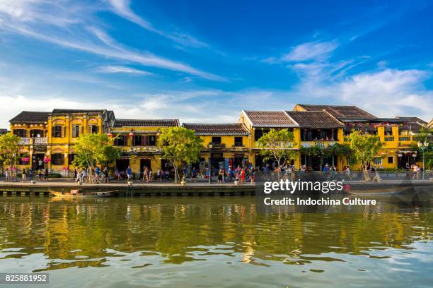 yellow old houses of ancient town hoi an nearby thu bon river - da nang stock pictures, royalty-free photos & images