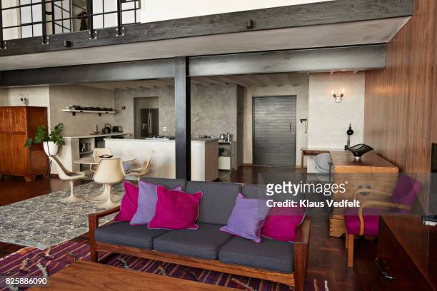 interior of new york style loft, holiday rental apartment - mezzanine stockfoto's en -beelden