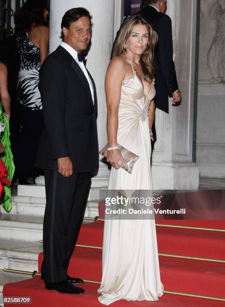Elizabeth Hurley with her husband Arun Nayar attend the Valentino: The Last Emperor VIP Screening during the 65th Venice Film Festival held at the...