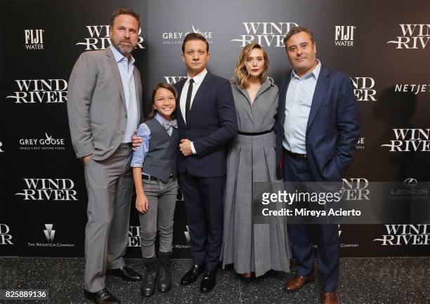 Basil Iwanyk, Teo Briones, Jeremy Renner, Elizabeth Olsen and Matthew George attend The Weinstein Company with FIJI, Grey Goose, Lexus and NetJets...