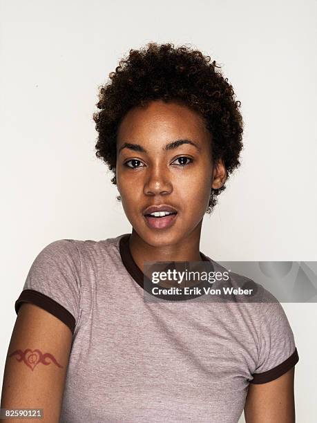 portrait of individual on a white background - african american young woman portrait white background stock pictures, royalty-free photos & images