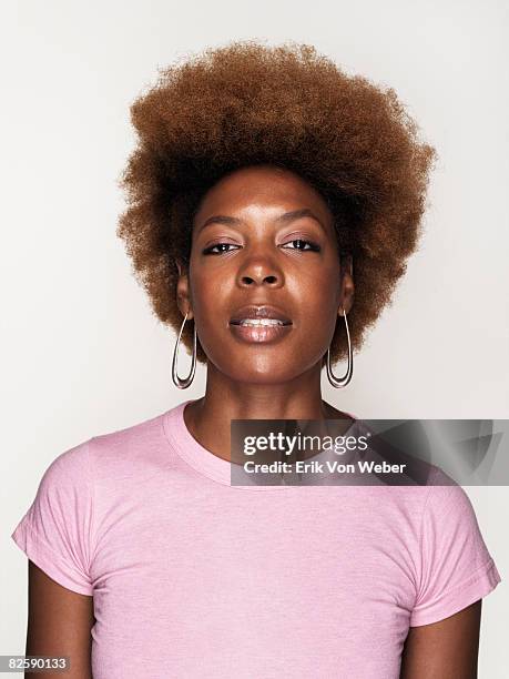 portrait of individual on a white background - afro fotografías e imágenes de stock