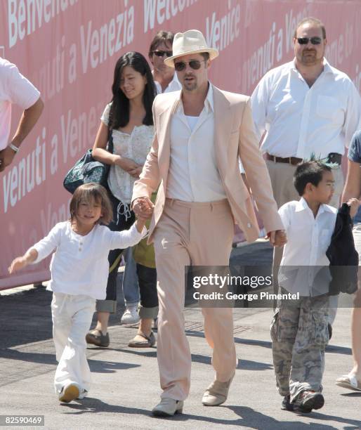 Brad Pitt along with his adopted sons Pax Thien Jolie-Pitt and Maddox Jolie-Pitt depart Venice following his stay for the Venice Film Festival on...