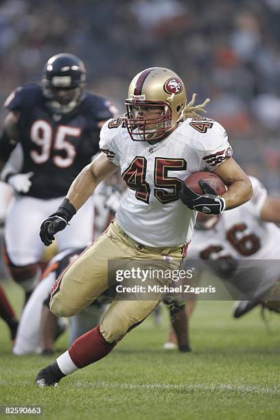 Zac Keasey of the San Francisco 49ers runs with the ball during the NFL game against the Chicago Bears at Soldier Field on August 21, 2008 in...