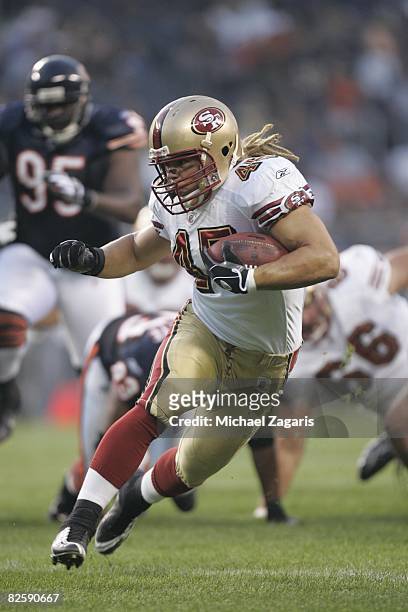 Zac Keasey of the San Francisco 49ers runs with the ball during the NFL game against the Chicago Bears at Soldier Field on August 21, 2008 in...