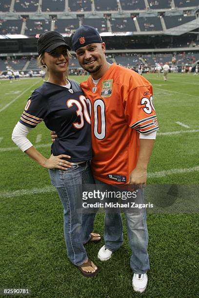 Nick Swisher of the Chicago White Sox with his girlfriend at the NFL game between the San Francisco 49ers and the Chicago Bears at Soldier Field on...