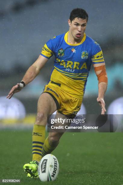 Mitchell Moses of the Eels kicks ahead during the round 22 NRL match between the Canterbury Bulldogs and the Parramatta Eels at ANZ Stadium on August...