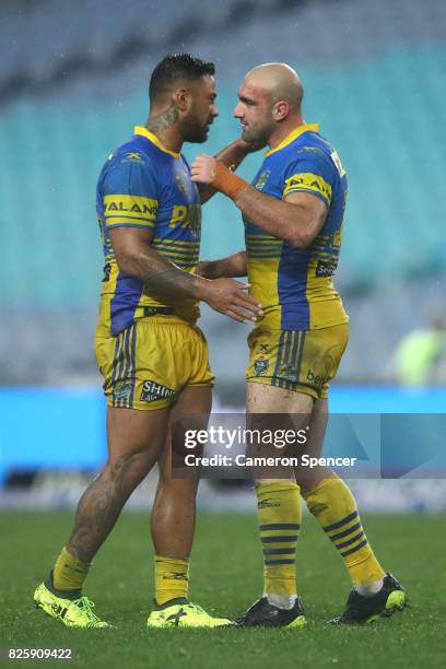 Kenny Edwards of the Eels and Tim Mannah of the Eels celebrate winning the round 22 NRL match between the Canterbury Bulldogs and the Parramatta Eels...