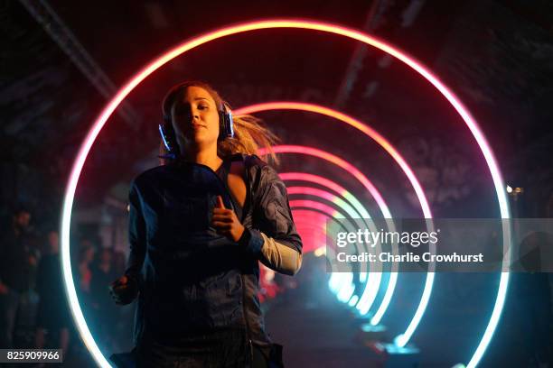 Athlete Lolo Jones attends the launch of ASICS Run The Tube experience, an epic 85-metre LED tunnel made from hoops of light. Run The Tube is part of...