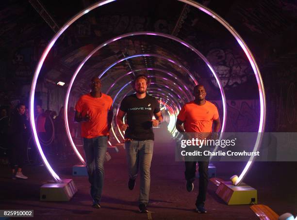 Legendary athletes Allen Johnson, Andreas Thorkildsen and Dwight Phillips attend the launch of ASICS Run The Tube experience, an epic 85-metre LED...