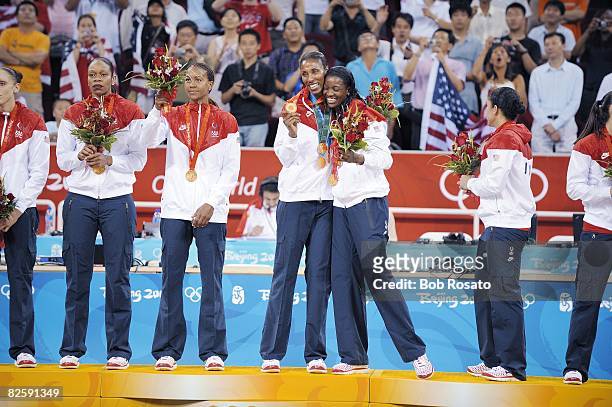Summer Olympics: USA Lisa Leslie and DeLisha Milton-Jones victorious on medal stand after winning Women's Gold Medal Game vs Australia at Olympic...