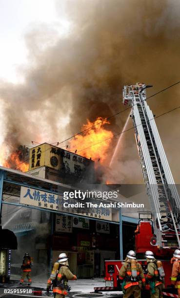 Fire destroyed several buildings outside Tokyo's famed Tsukiji fish market on August 3, 2017 in Tokyo, Japan. The blaze in the Tsukiji Outer Market,...