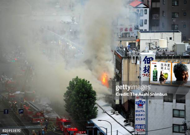 Fire destroyed several buildings outside Tokyo's famed Tsukiji fish market on August 3, 2017 in Tokyo, Japan. The blaze in the Tsukiji Outer Market,...
