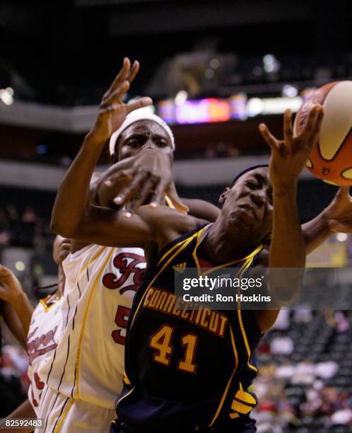 Kerri Gardin of the Connecticut Sun battles Bernadette Ngoyisa of the Indiana Fever at Conseco Fieldhouse on August 28, 2008 in Indianapolis,...