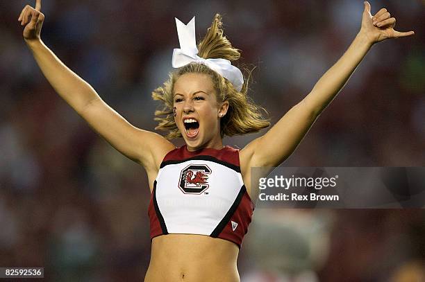 South Carolina Gamecocks cheerleader gets the crowd ready prior to kick off against North Carolina State Wolfpack at Williams-Brice Stadium on August...