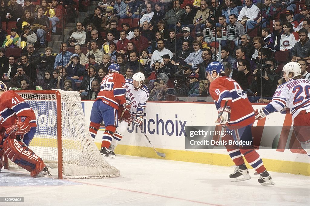 Murray Ranger Canadiens defenceman Murray Baron pins Ranger opponent to the... News ...