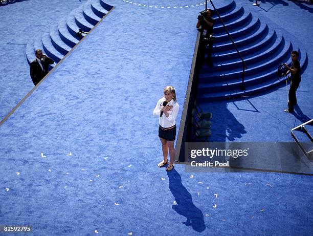 Olympic gymnast Shawn Johnson recites the Pledge of Allegiance on day four of the Democratic National Convention at Invesco Field at Mile High August...