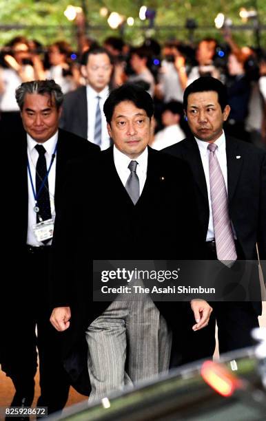 New Defense Minister Itsunori Onodera leaves for the Imperial Palace for the attestation ceremony at the prime minister's official residence on...