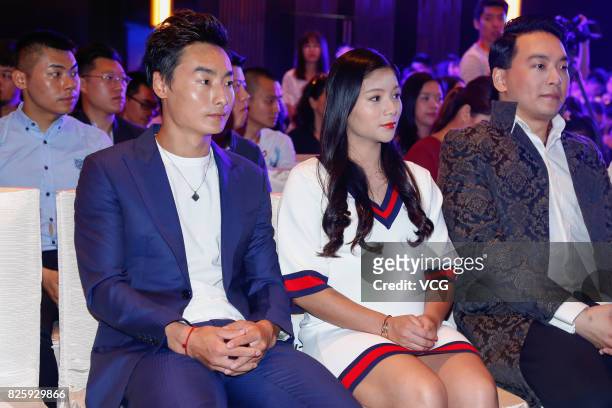Diving couple Qin Kai and He Zi attend the press conference of director Huo Jianqi's film on August 3, 2017 in Beijing, China.
