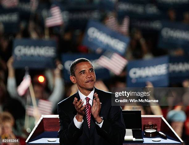 Democratic U.S. Presidential nominee Sen. Barack Obama reacts to the crowd on day four of the Democratic National Convention at Invesco Field at Mile...