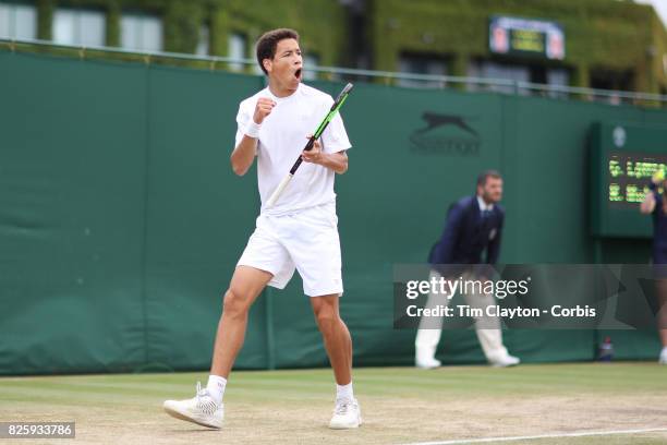 George Loffhagen of Great Britain in action against Rudolf Molleker of Germany in the Boys' Singles Tournament during the Wimbledon Lawn Tennis...