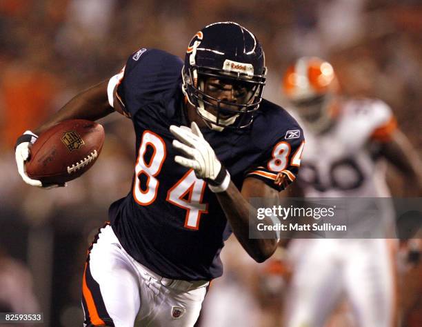 Brandon Rideau of the Chicago Bears runs the ball against the Cleveland Browns during a preseason NFL game at Cleveland Browns Stadium on August 28,...