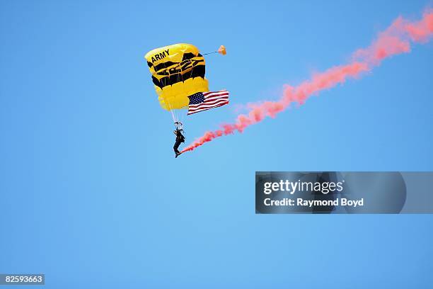 The U.S. Army Parachute Team, The Golden Knights parachute onto North Avenue Beach during the 50th Annual Chicago Air and Water Show in Chicago,...