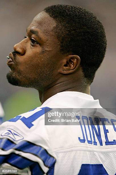 Cornerback Adam "Pacman" Jones of the Dallas Cowboys watches from the sidelines during a preseason game against the Minnesota Vikings after being...