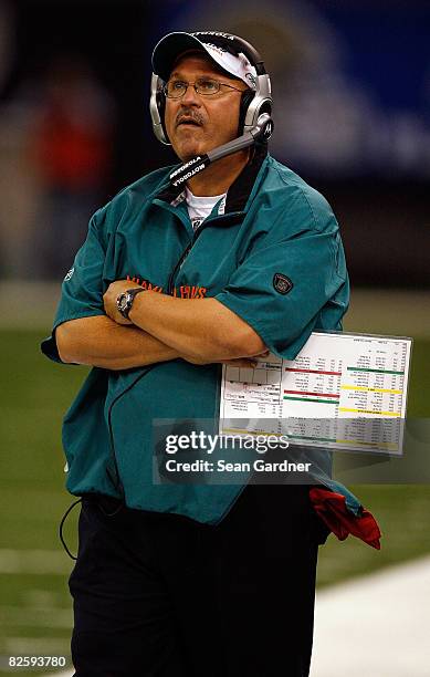 Head coach Tony Sparano of the Miami Dolphins looks to the score board late in the fourth quarter as his team took on the New Orleans Saints during...