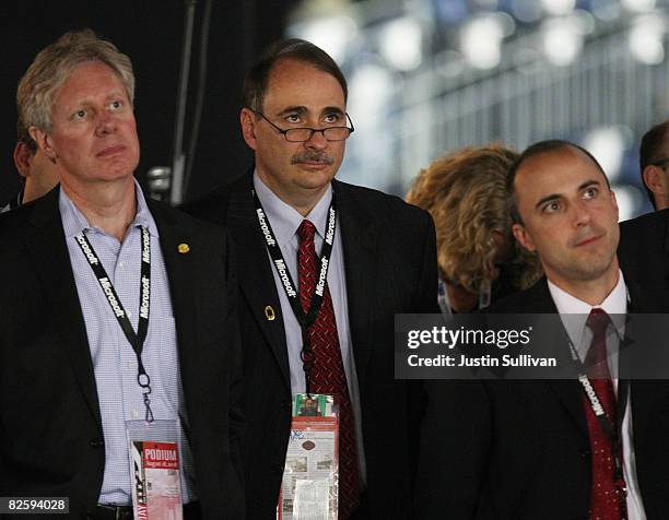 Chief strategist David Axelrod and other Obama staffers watch the proceedings on day four of the Democratic National Convention at Invesco Field at...