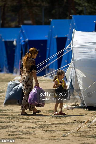 Georgian IDP families adjust to daily life at a tent city August 28, 2008 in Gori, Georgia. During the day, various humanitarian aid organizations...