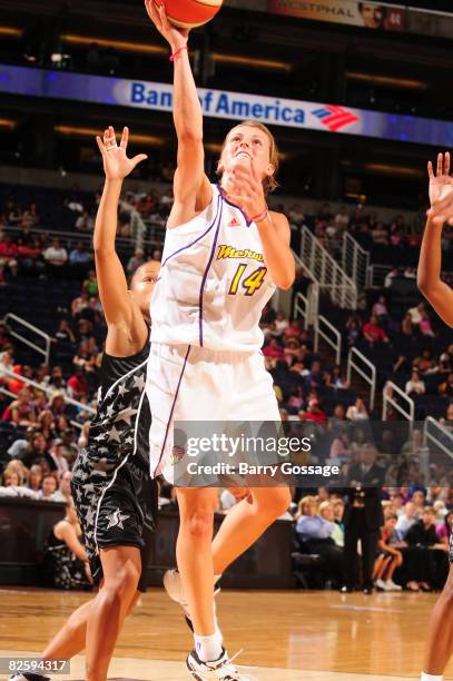 Allie Quigley of the Phoenix Mercury shoots against the San Antonio Silver Stars on August 28 at U.S. Airways Center in Phoenix, Arizona. NOTE TO...