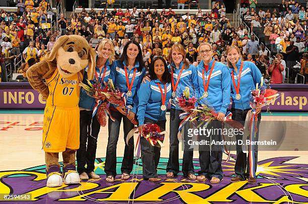 The United States Women's Water Polo team poses for a photo during halftime of the game against the Sacramento Monarchs on August 28, 2008 at Staples...