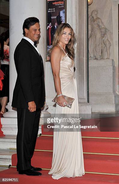 Arun Nayar and Elizabeth Hurley attend the premiere of the movie "Valentino: The Last Emperor" held at Teatro La Fenice during the 65th Venice Film...