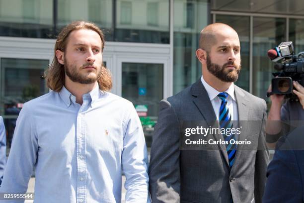 Const. Michael Theriault and his brother, Christian Theriault leave Durham Region Courthouse in Oshawa, following and appearance in relation to the...