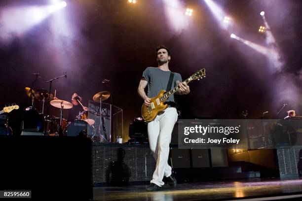 Matt Flynn, Adam Levine and Jesse Carmichael of Maroon 5 perform live in concert at the Verizon Wireless Music Center on August 28, 2008 in...