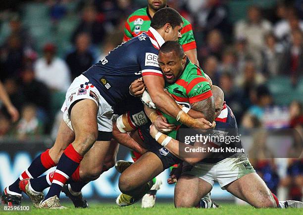 Roy Asotasi of the Rabbitohs is tackled during the round 25 NRL match between the Sydney Roosters and the South Sydney Rabbitohs held at Sydney...