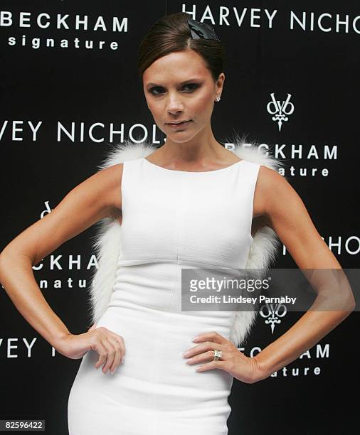 Victoria Beckham attends a photocall for the launch of hers' and her husband David Beckham's new fragrance entitled 'Signature For Him and Signature...