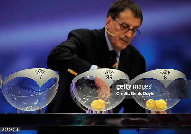 Official pulls a ball from the pot during the UEFA Cup Draw for the 2008/2009 season at the Grimaldi Forum on August 29, 2008 in Monte Carlo, Monaco.