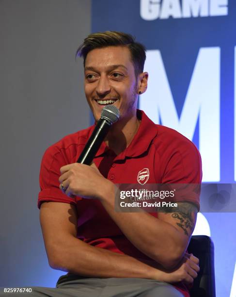 Mesut Ozil of Arsenal takes part in a Q&A during Memebers Day at Emirates Stadium on August 3, 2017 in London, England.