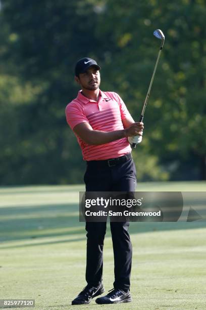 Jason Day of Australia plays a shot on the 11th fairway during thei first round of the World Golf Championships - Bridgestone Invitational at...